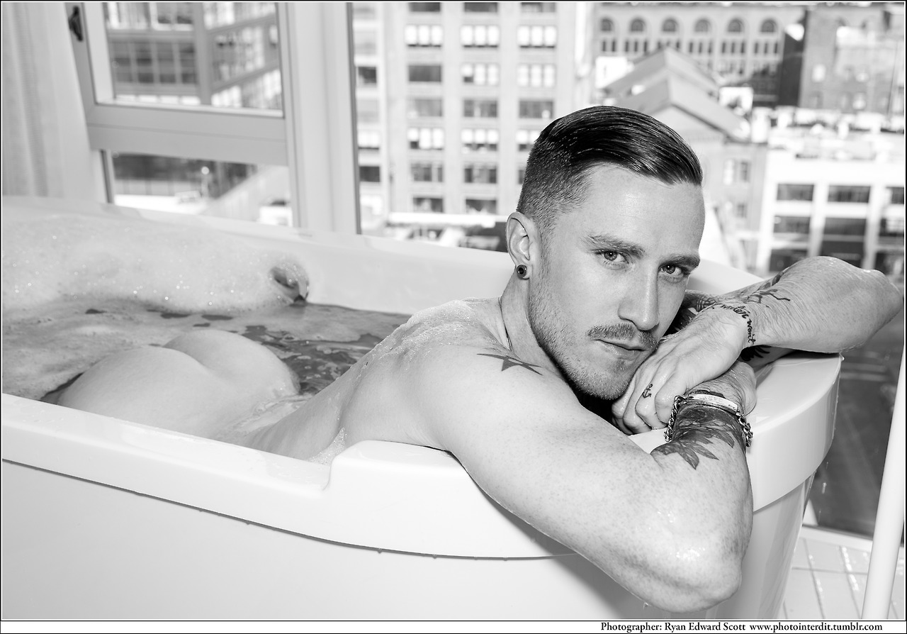 Retired gay porn star Kennedy Carter poses naked for photographer Ryan Edward Scott in an editorial for The Summer Diary Project.