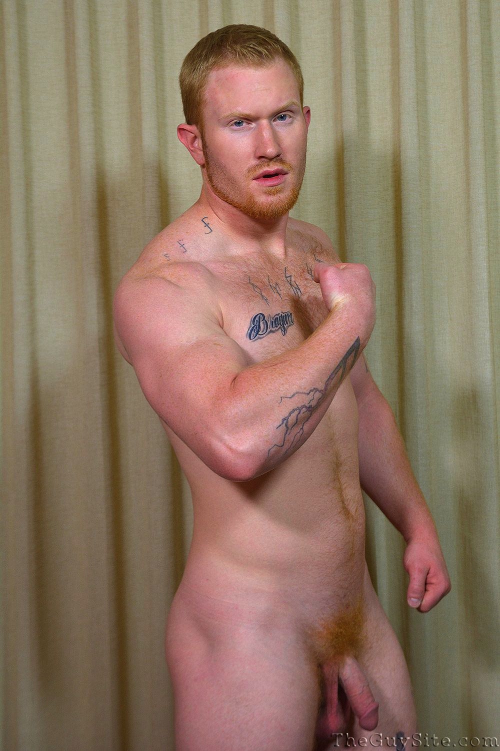 Muscular redhead Colby bottoms for Chance in a gay porn scene for The Guy Site.